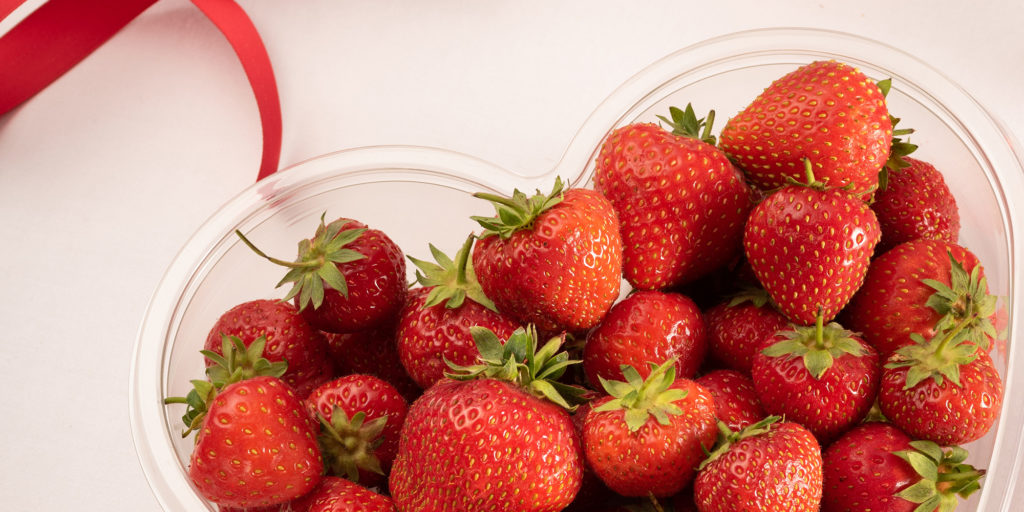 strawberries in a heart shaped punnet