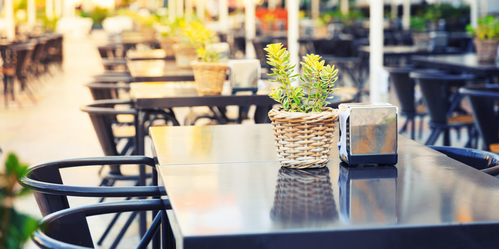 Empty outdoor restaurant tables